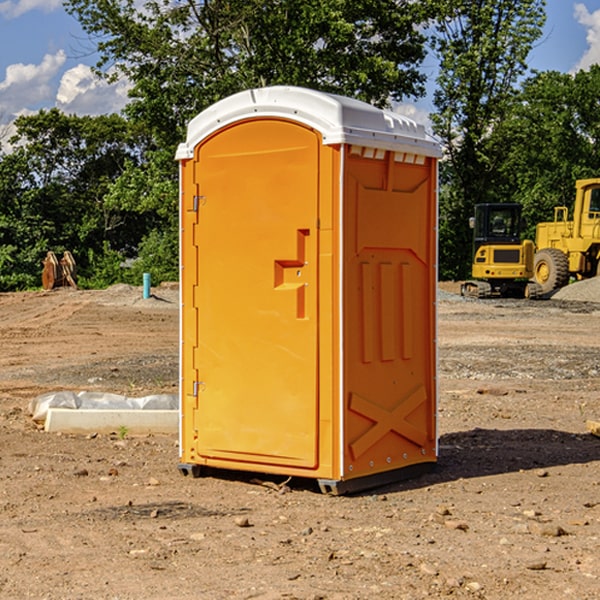 what is the cost difference between standard and deluxe portable restroom rentals in Highland Acres